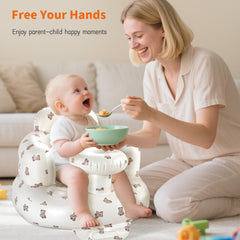 Hvygss tray-equipped chair ready to hold bottles and toys during feeding.