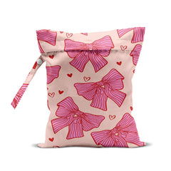 HZMLYDJ Pink Bow Wet Bag front view, lightweight travel organizer for wet swimsuits.