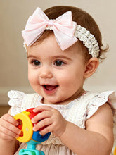 ICKEYOU baby hairband pink bow close-up showcases soft, stretchy comfort for delicate scalps