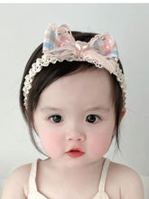 ICKEYOU baby hairband with pink bow, soft stretch ensures comfy all-day wear.