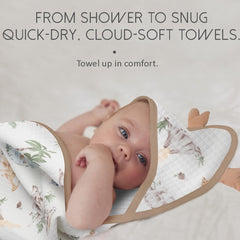 ICKYOU hooded towel with dinosaur hood, drying a baby's hair after bath