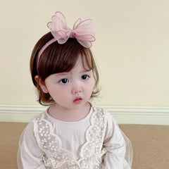 ICKEYOU newborn photoshoot headband highlights handmade craftsmanship