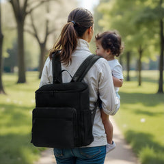 ILCOLPO diaper bag backpack open wide, showcasing 16 pockets for easy packing.