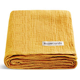Meowcards Muslin Swaddle Blanket offers generous coverage for versatile swaddling and covers.