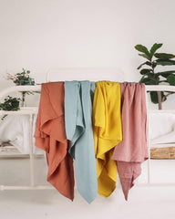 Meowcards Muslin Swaddle Blanket doubles as a soft nursing cover when needed.