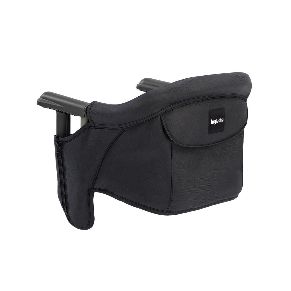 Inglesina Fast Table Chair folded compact for easy travel and storage.