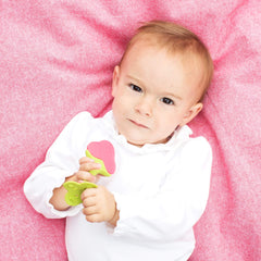 Flexible petal textures on the Berry teether encourage gentle gum massage.