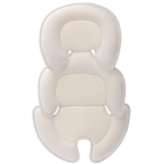 Innokids head-and-body-support-pillow in car seat providing a cozy cradle.