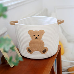 INough basket view shows side placement for easy access to toys