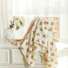 Insular muslin swaddle in use as a snug newborn wrap