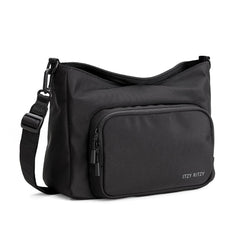 Itzy Ritzy Belong Cargo Caddy attached to a stroller for hands-free essentials on the go