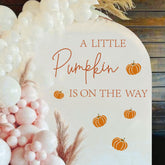 JarThenaAMCS A Little Pumpkin is on the Way wall sticker creates a festive gender reveal backdrop.