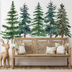 JarThenaAMCS watercolor pine trees bring a festive forest feel to nurseries.