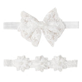 Jawfait baby headband with white flowers, gentle stretch for all-day comfort at christenings.