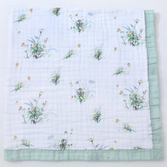 Jay & Ava Soft Cotton Muslin Blanket folded for easy warmth and breathability