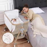 Jestonten baby bassinet with mattress and waterproof sheet for easy, clean newborn sleep.