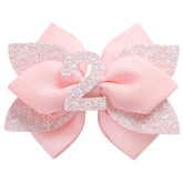 Jiaduo pink birthday bow 1-year style with elastic band for secure wear.
