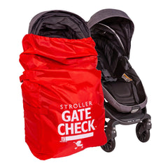 J.L. Childress gate check bag in red protecting a stroller at the gate