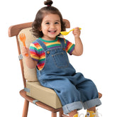 JLGCUF booster seat attached to a chair with secure straps for safe dining.