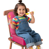 JLGCUF booster seat front view with secure straps for kitchen chairs.