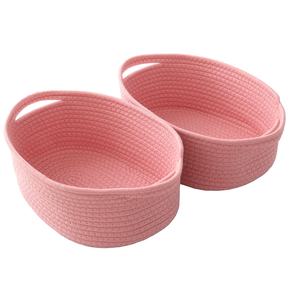 JMvicyroam woven basket with handles offers compact shelf storage in pink.