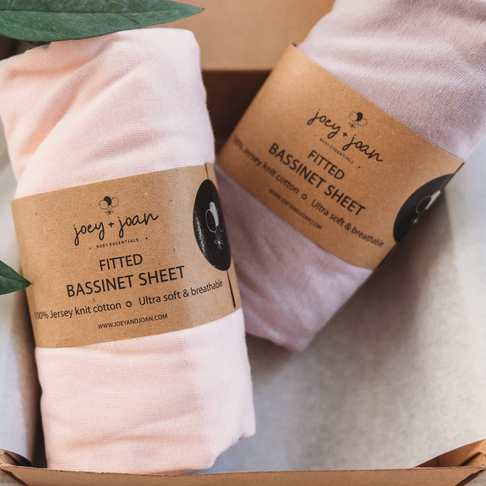 Joey + Joan bassinet sheet soft texture close-up, breathable jersey cotton for gentle sleep.