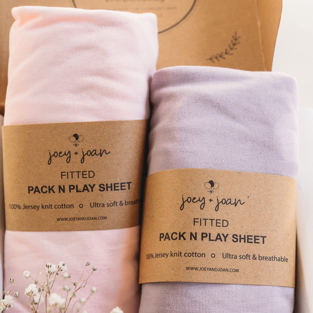 Joey and Joan Pack and Play Sheets fitted on Breeze Plus for snug, safe sleep
