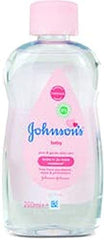 Johnson’s Baby Oil close-up showing silky texture for smooth skin.