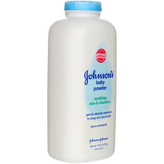 Johnson’s Aloe & Vitamin E baby powder being gently applied to skin by hand.