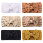 Jollybows beige nylon headband for gentle comfortable wear on baby skin