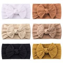Jollybows beige nylon headband for gentle comfortable wear on baby skin