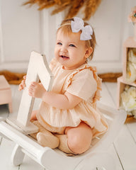 Jollybows nylon elastic band prevents slipping with comfortable stretch.