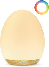 JolyWell night light egg with wood finish provides gentle glow for nursery feeding sessions.