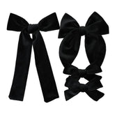 Jomila long tail velvet bow clip enhances toddler ponytails with secure grip