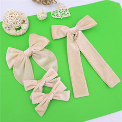 Jomila knot velvet bow clip complements twin styles for matching outfits