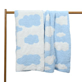 JOOJA soft knitted baby cloud blanket in blue, ideal for newborn swaddling.
