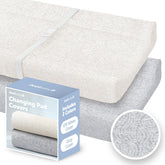 Jool Baby changing pad cover in off-white close-up showing soft fabric for gentle diaper changes.