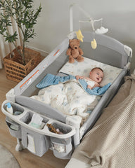 Joybai 4-in-1 bassinet beside sleeper in use, close and convenient for nighttime care.