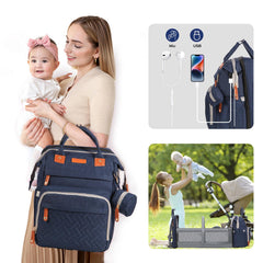 JOYCE bag features folding diaper pad for quick comfortable changes anywhere
