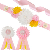 JOYMEMO pink daisy maternity sash shown with boho styling for baby shower photos