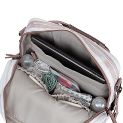 JuJuBe Nature Babe includes memory foam changing pad for on-the-go changes.