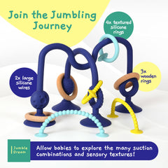 Jumble Dream Jangle baby teether on car seat, travel-friendly sensory toy.