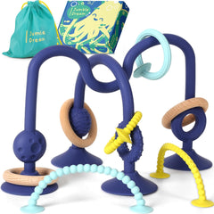 Jumble Dream Jangle teether with suction attached to high chair for mess-free mealtime.