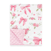 Jundetye baby blanket with pink rose design keeps baby cozy during naps.