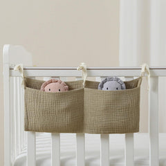 JUSTAUS crib bedside storage pocket keeps bottles within reach