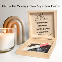 Close-up of the angel design that honors an angel baby.
