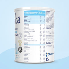 Kabrita baby bottle pour closeup demonstrates smooth mixing and easy feeding.