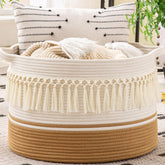 KAKAMAY large blanket basket with white fringe for stylish living room storage.