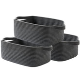 KALLAX small woven basket in dark grey on shelf for compact organization