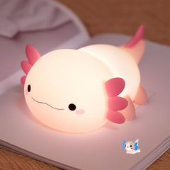 KangTen CHEN pink axolotl night light on bedside providing gentle bedtime illumination